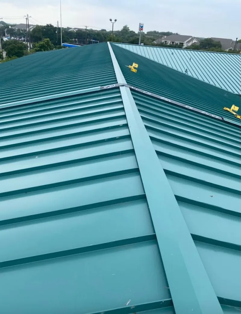 Green commercial metal roof ridge and valley for Metal Roof Repair in Manor