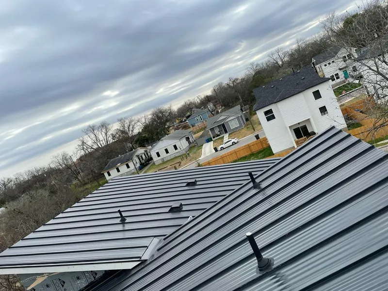 Standing seam metal roof panels with vents for Skylight Repair in Manor